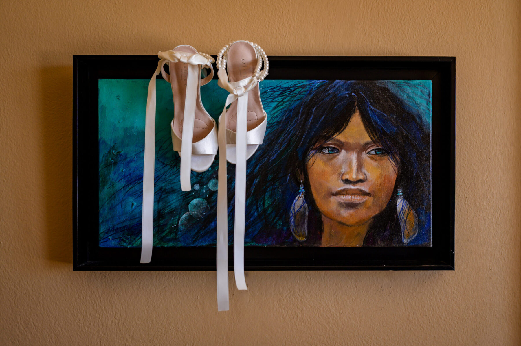 shoes hanging on a frame