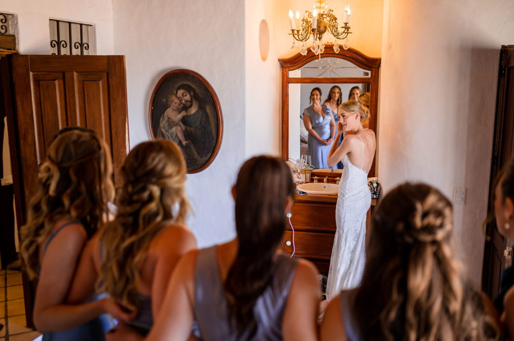 destination wedding puerto vallarta bride getting ready with bridesmaids watching